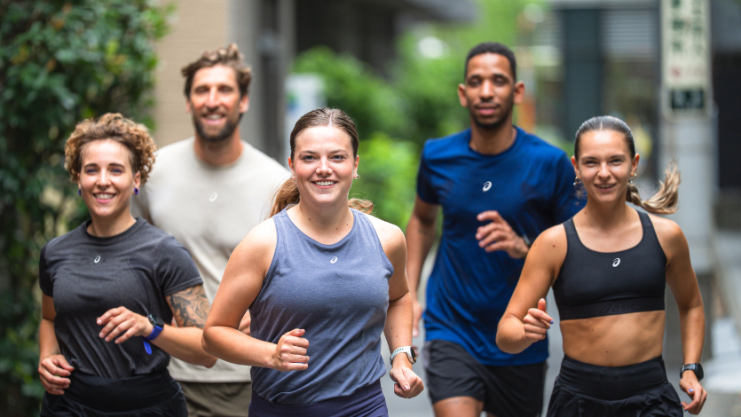 A group of runners at a city run.