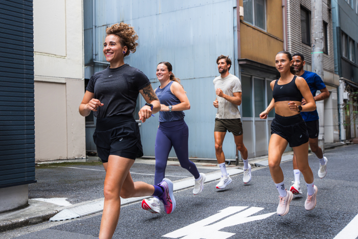 A group of runners at a city run.